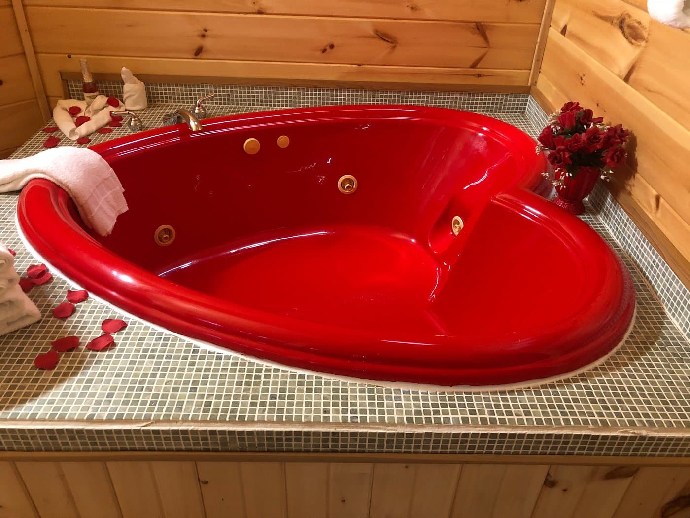Country Road Cabins has room with heart-shaped Jacuzzi