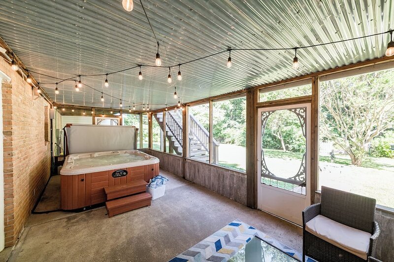 Screened-in Hot Tub with 5 min to LU + Shopping! has suites with private spa tubs