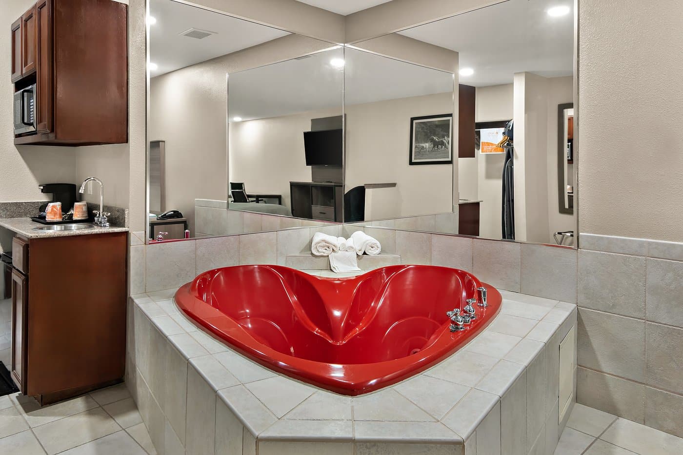 Quality Inn & Suites Weatherford has heart-shaped Jacuzzi in room